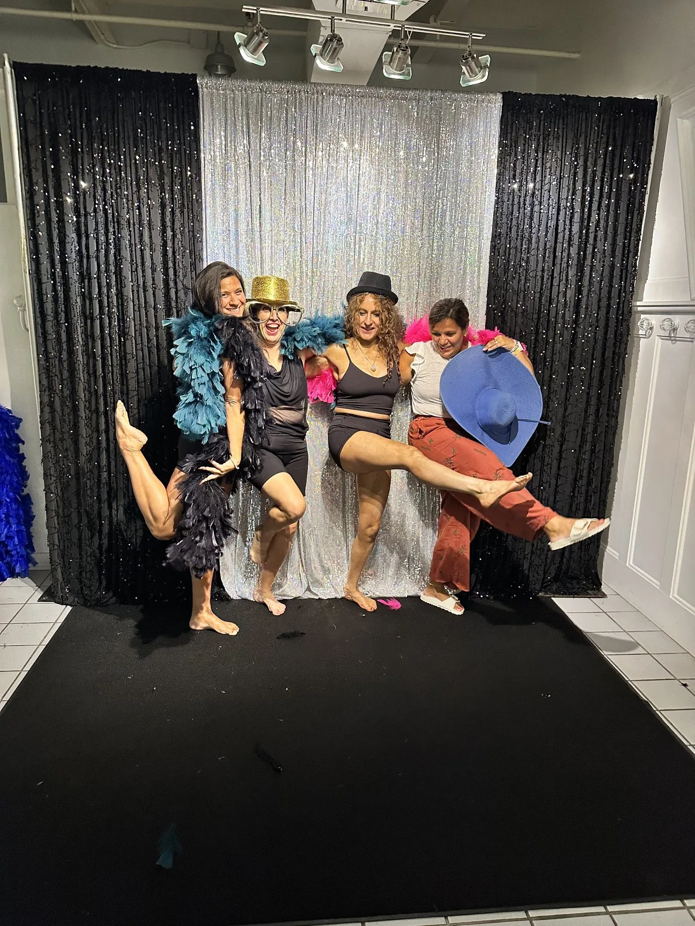 Friends laughing together at the Bridge and Bloom photo booth