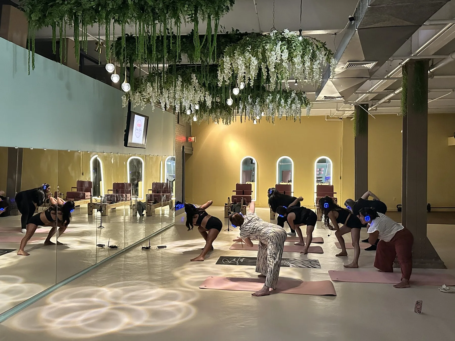 Bridge and Bloom members sharing a silent yoga experience
